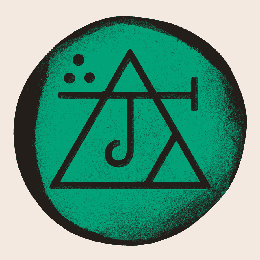 A personal sigil for Alex Sberna. The sigil appears to be engraved in a disc of roughly-cut green stone or glass.